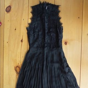 Lace top dress with accordion skirt, tea length